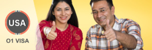 Happy couple giving thumbs up, symbolizing success with the O1 visa process.