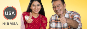 Happy couple giving thumbs up, representing successful H1B visa approvals.