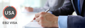 Business professional writing notes during an EB2 visa application preparation.