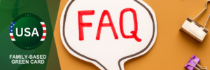 FAQ sign on a table, answering family-based green card queries.