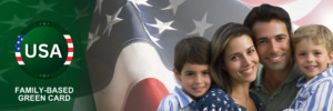 Family smiling in front of the USA flag, showcasing unity through immigration.